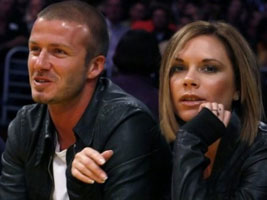     (Victoria and David Beckham)